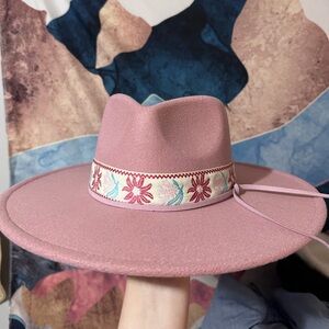 Gorgeous pink wide brimmed hat.